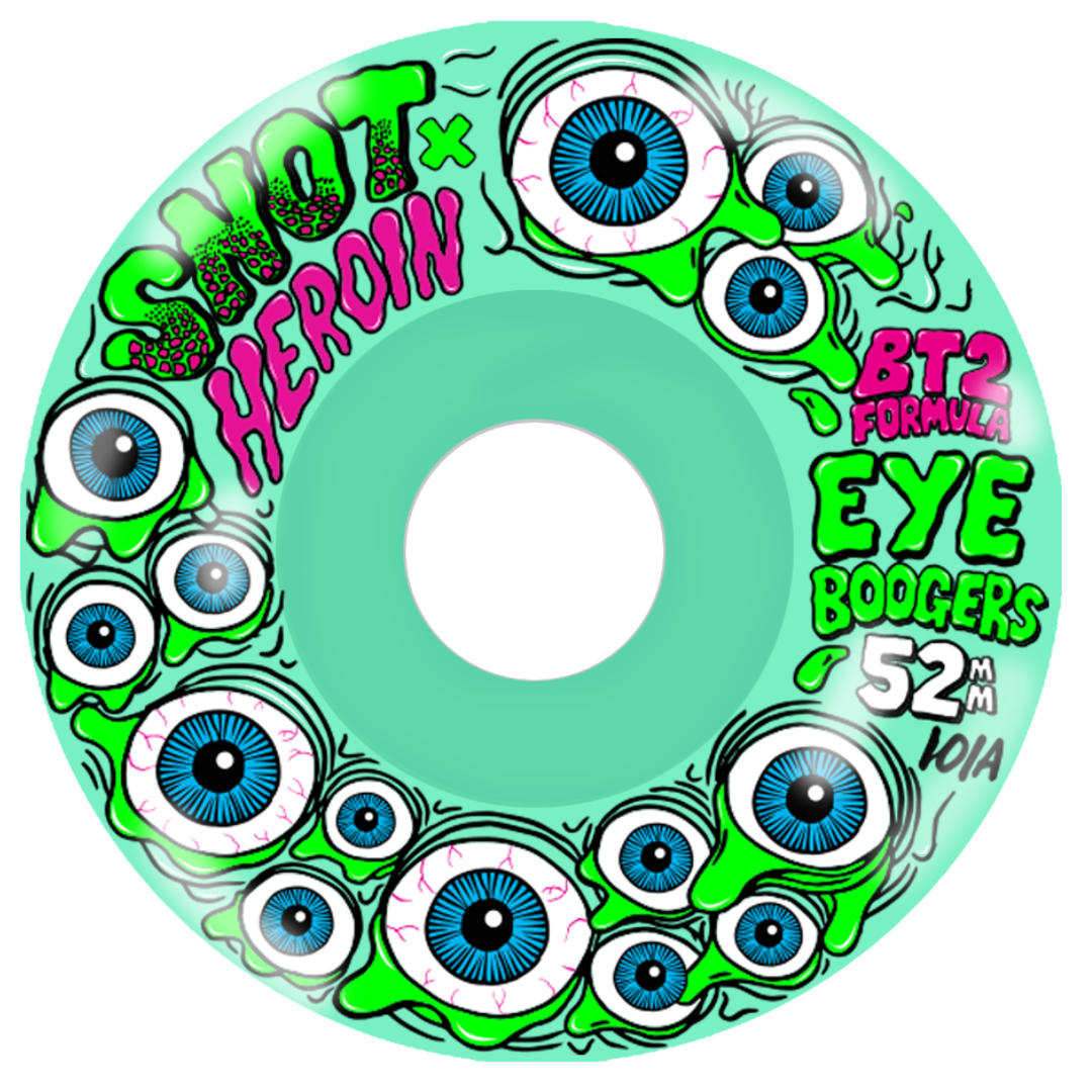 A mint green skateboard wheel with a colorful graphic design featuring cartoon eyes, green slime, and pink and green text reading 'SHOT x HEROIN', 'BT2 FORMULA', and 'EYE BOODERS 52mm 10A'.