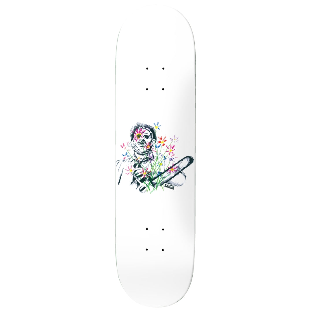 Skateboard deck with a colorful design of a skull and flowers on a white background