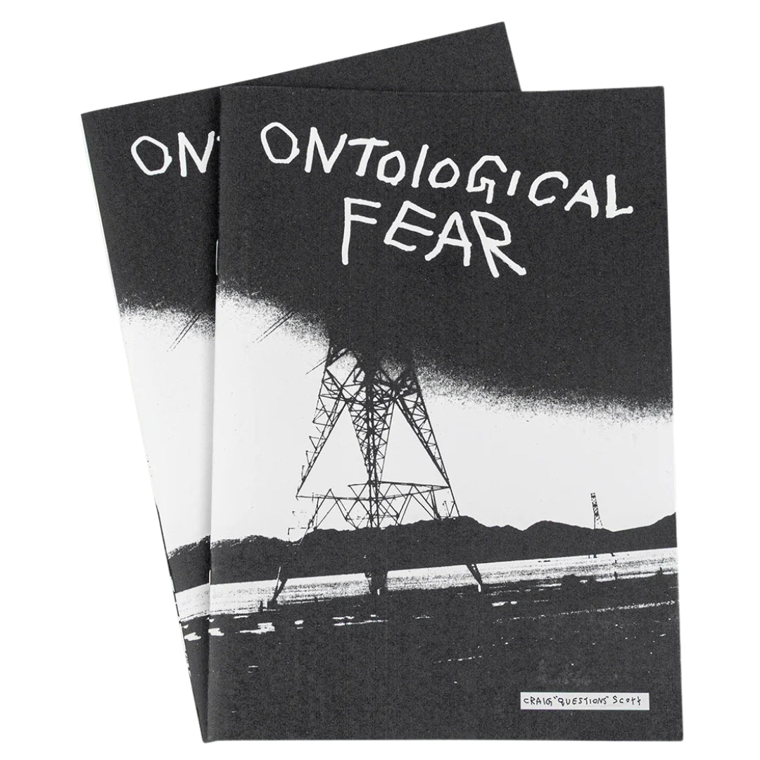 Two black books titled 'Ontological Fear' with a silhouette of a tower on the cover.