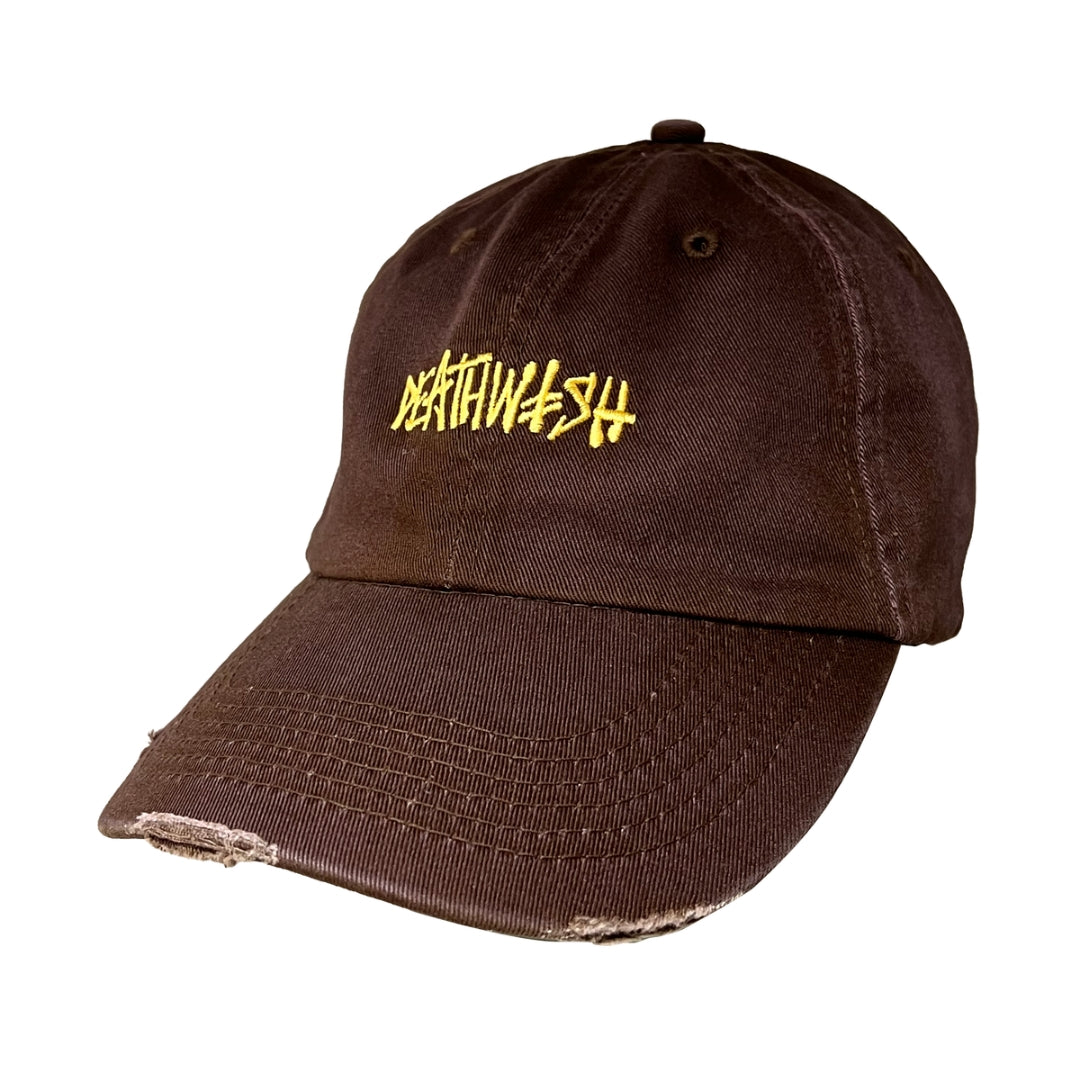 Brown cap with yellow text on a white background