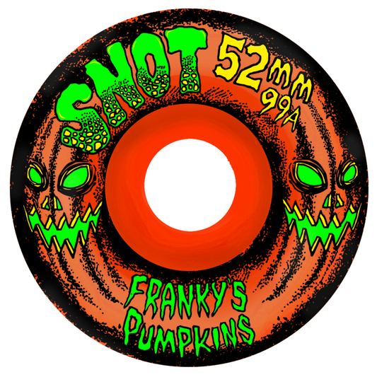 A close-up of a skateboard wheel graphic featuring a jack-o'-lantern face with green eyes and a stitched pumpkin design. The wheel has a bright orange center, black outer ring, and bold text reading 'SHOT 52mm 99A' and 'FRANKY'S PUMPKINS' in neon green and yellow.