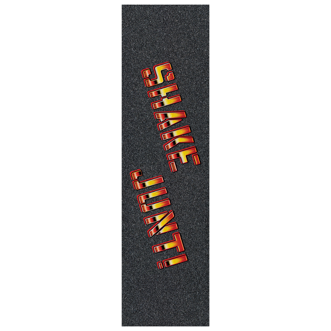 A vertical grip tape strip on a white background, featuring a dark gray textured surface with the words 'SHAKE JUMP!' printed diagonally in red, orange, and yellow 3D lettering.