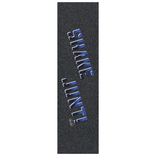 A vertical close-up of skateboard grip tape with a dark gray textured surface and large blue and white 'SHAKE LINT' lettering printed diagonally.