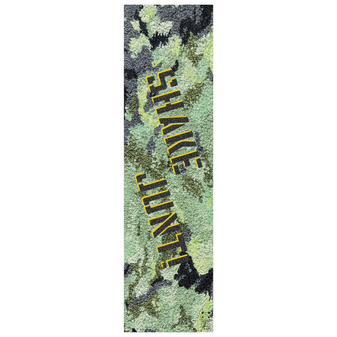 A long, narrow rug or mat with a green camouflage pattern and large yellow text reading 'SHAKE JUNKIE' running diagonally across it, shown on a plain white background.