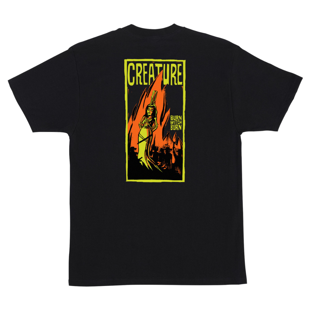 A black short-sleeve t-shirt shown flat against a white background, featuring a large graphic print on the back with the word 'CREATURE' in yellow above an illustration in yellow, orange, and black.