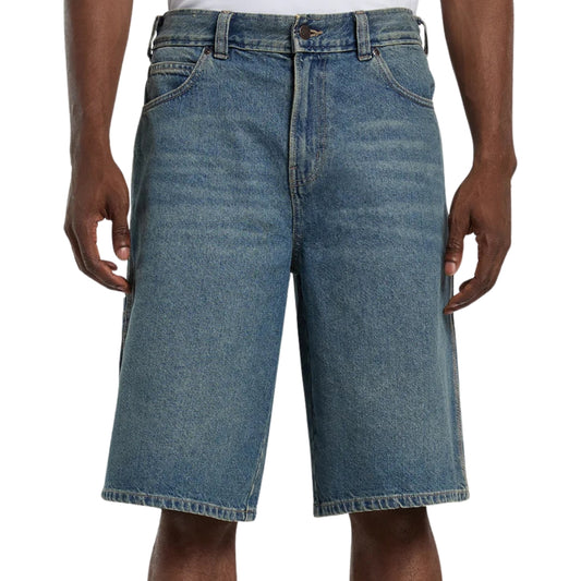 Blue denim shorts worn by a person on a white background
