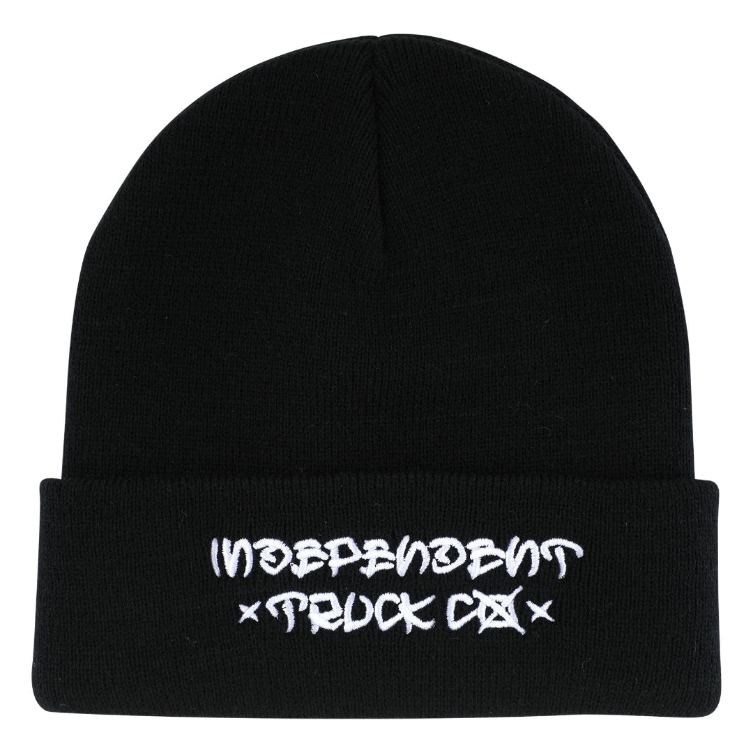 A black knit beanie hat with a folded cuff, featuring white embroidered text that reads 'INDEPENDENT TRUCK CO' on the front, set against a plain white background.