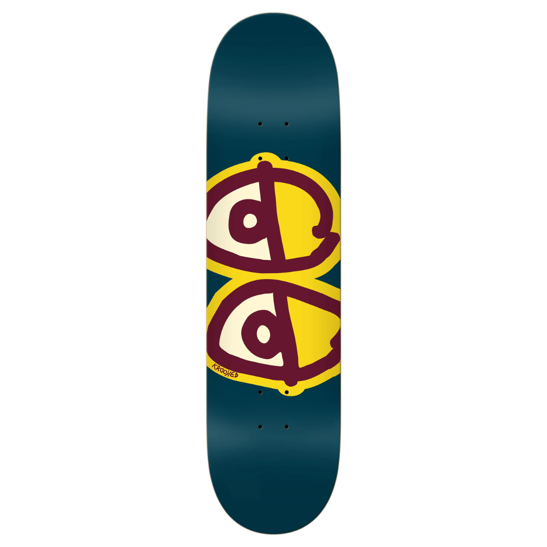 A skateboard deck shown vertically against a plain white background. The deck has a dark teal-blue base with a large graphic in the center featuring two stylized yellow eyes outlined in maroon.