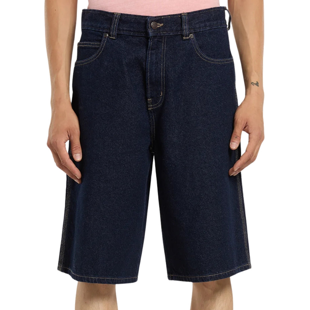 Dark blue denim shorts worn by a person on a white background