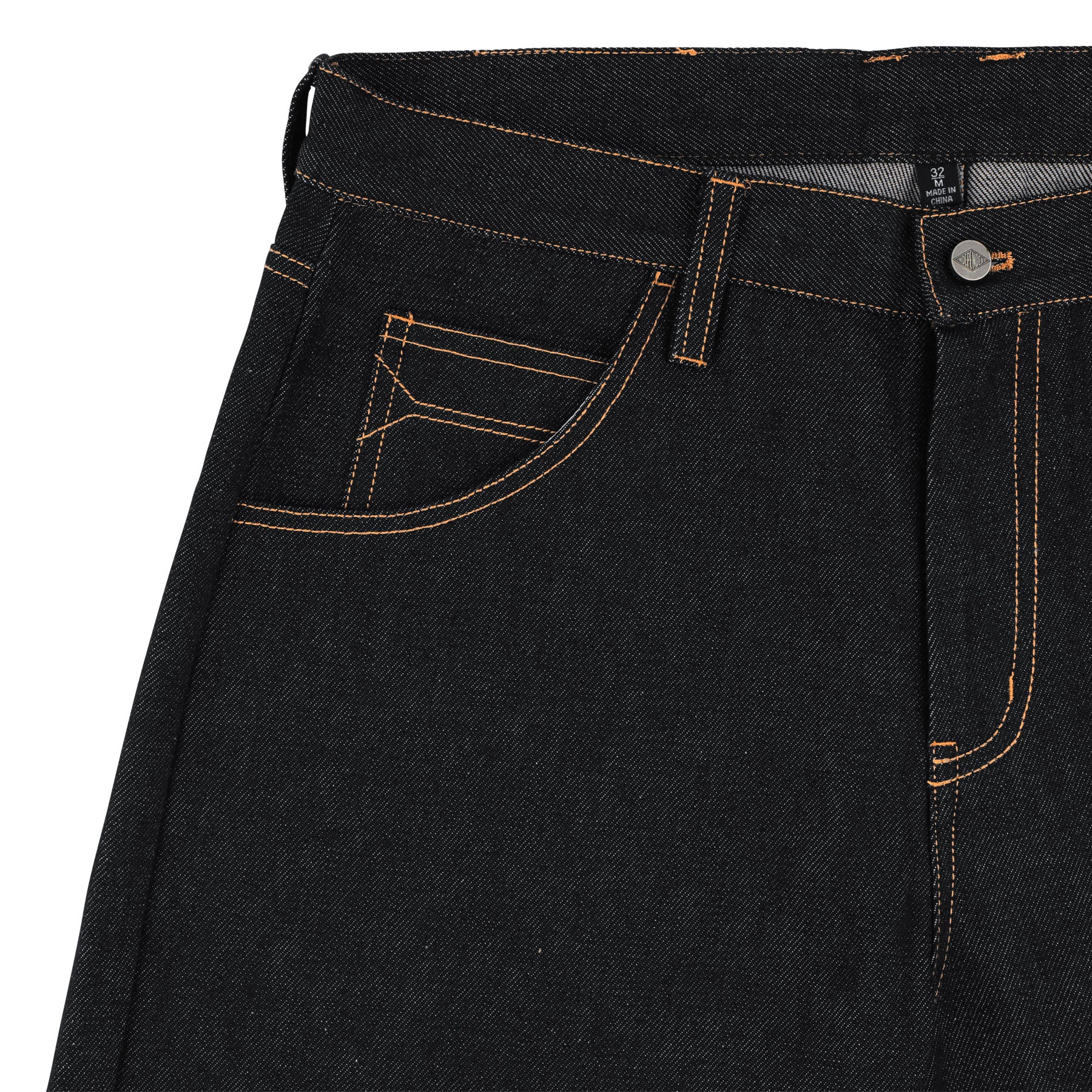 Close-up of black denim jeans with stitching details on a white background