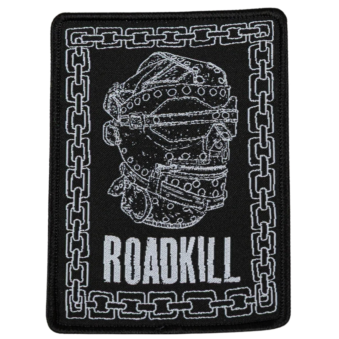 Patch with skull and chains design and 'ROADKILL' text on a black background