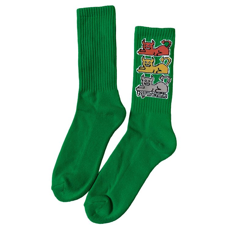 Green socks with cat illustrations on a white background