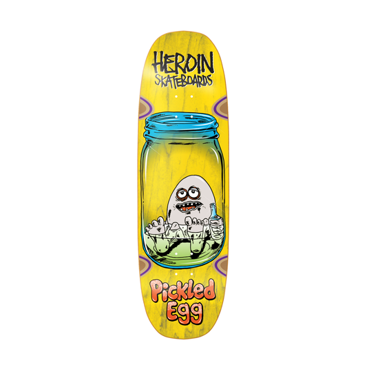 A Herdin Skateboards deck featuring a yellow background with a cartoon 'Pickled Egg' graphic in a glass jar, with the brand name 'HERDIN SKATEBOARDS' printed at the top and 'Pickled Egg' at the bottom.