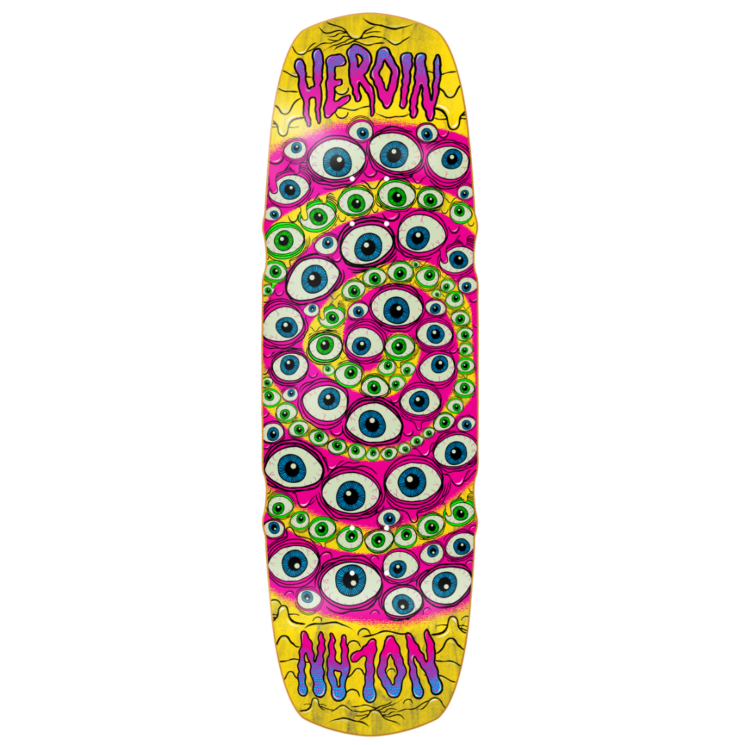 A long, narrow skateboard deck with a psychedelic design featuring a dense pattern of cartoon eyes in pink, green, blue, and white, set against yellow borders at the top and bottom. The words 'HEROIN' and 'NU-YON' are written in stylized purple and blue lettering on the yellow sections.