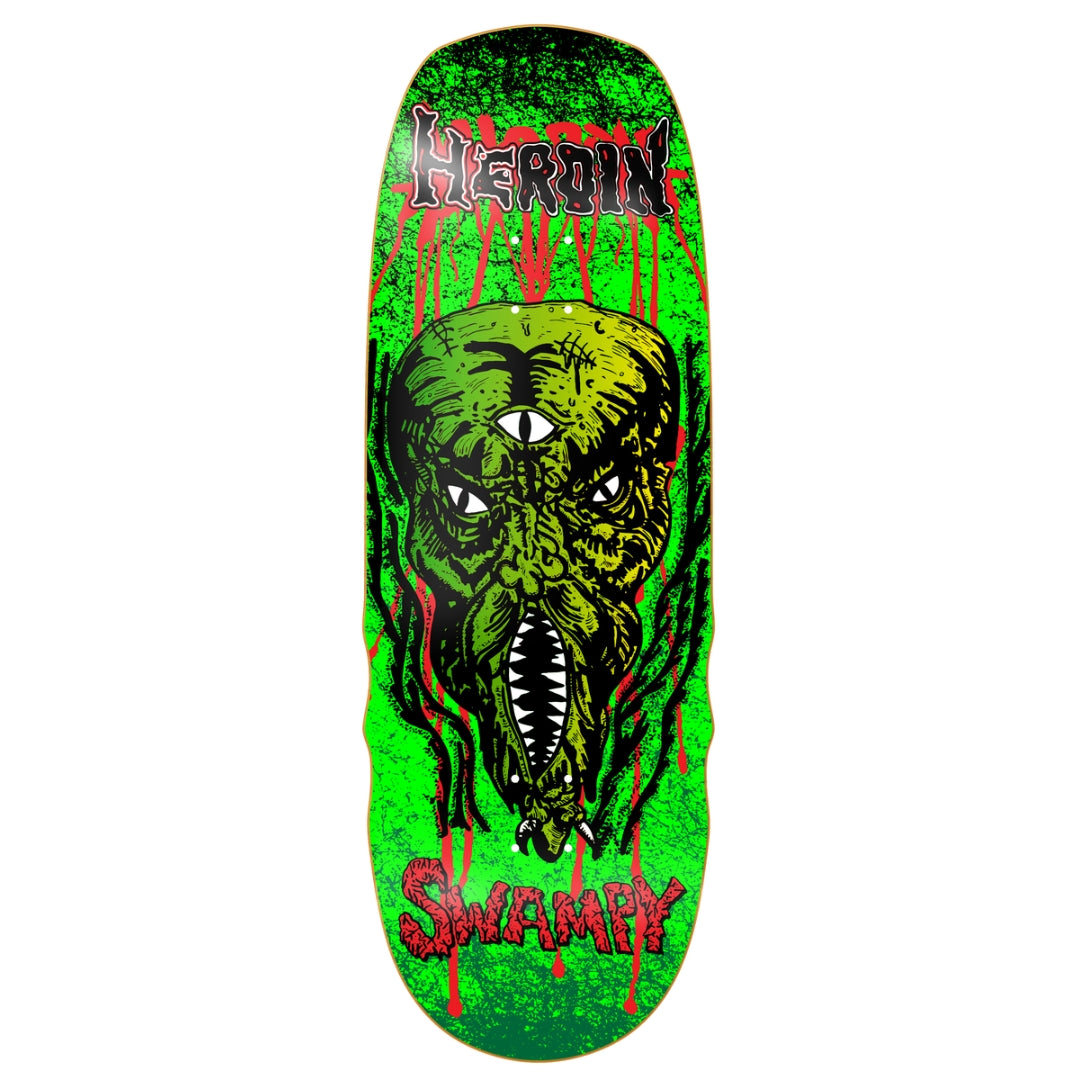 Skateboard deck with a green and black design featuring a face and the word 'Heroin' on a white background.